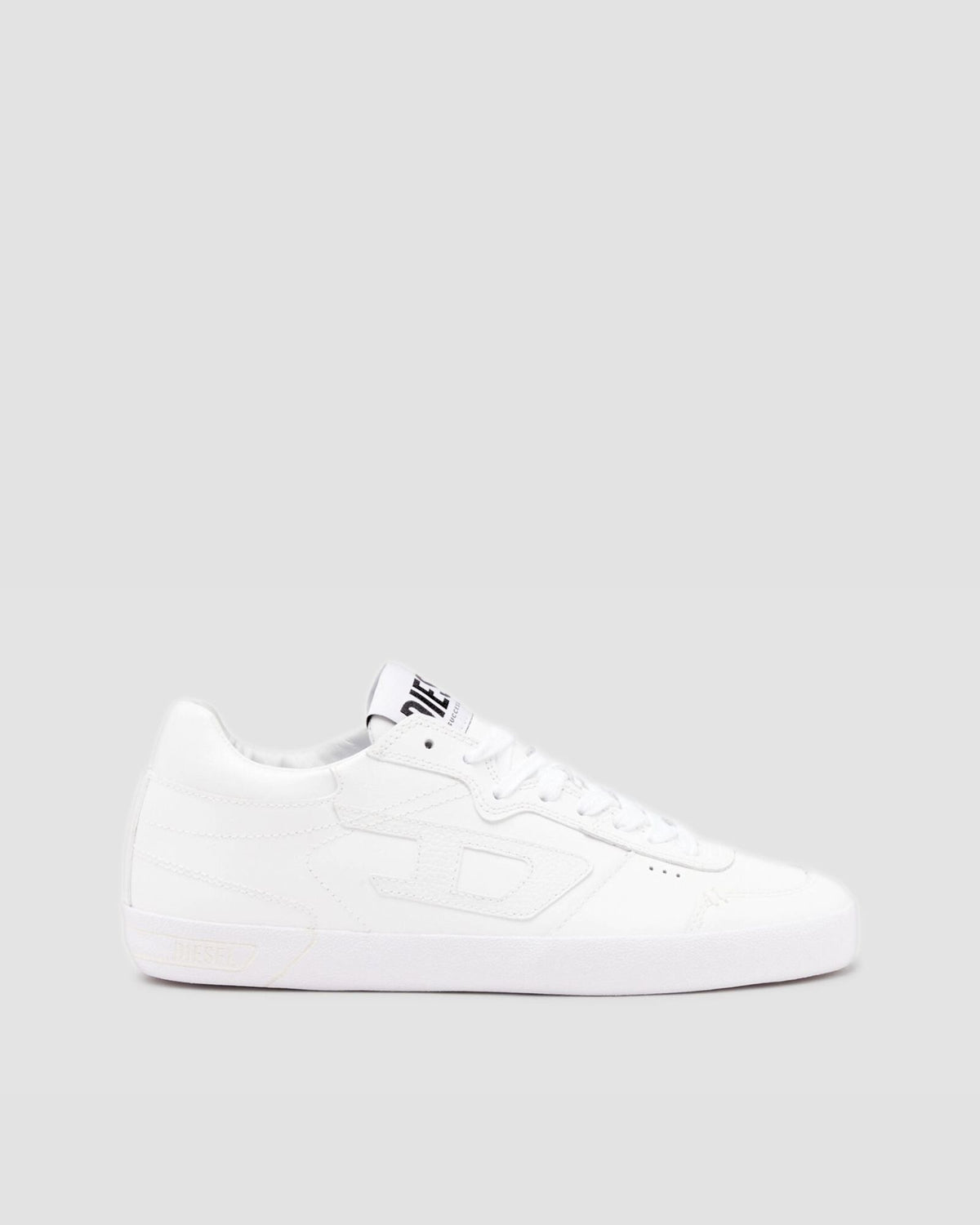 White sneaker with black logo on a light gray background