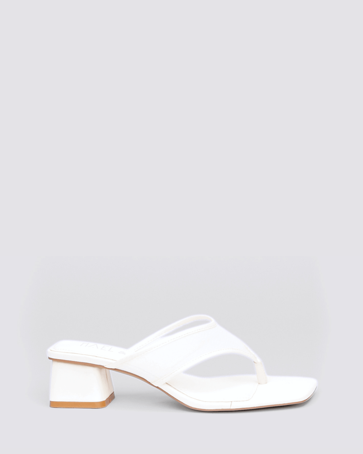 CELESTRIAL HEELED MULES WHITE